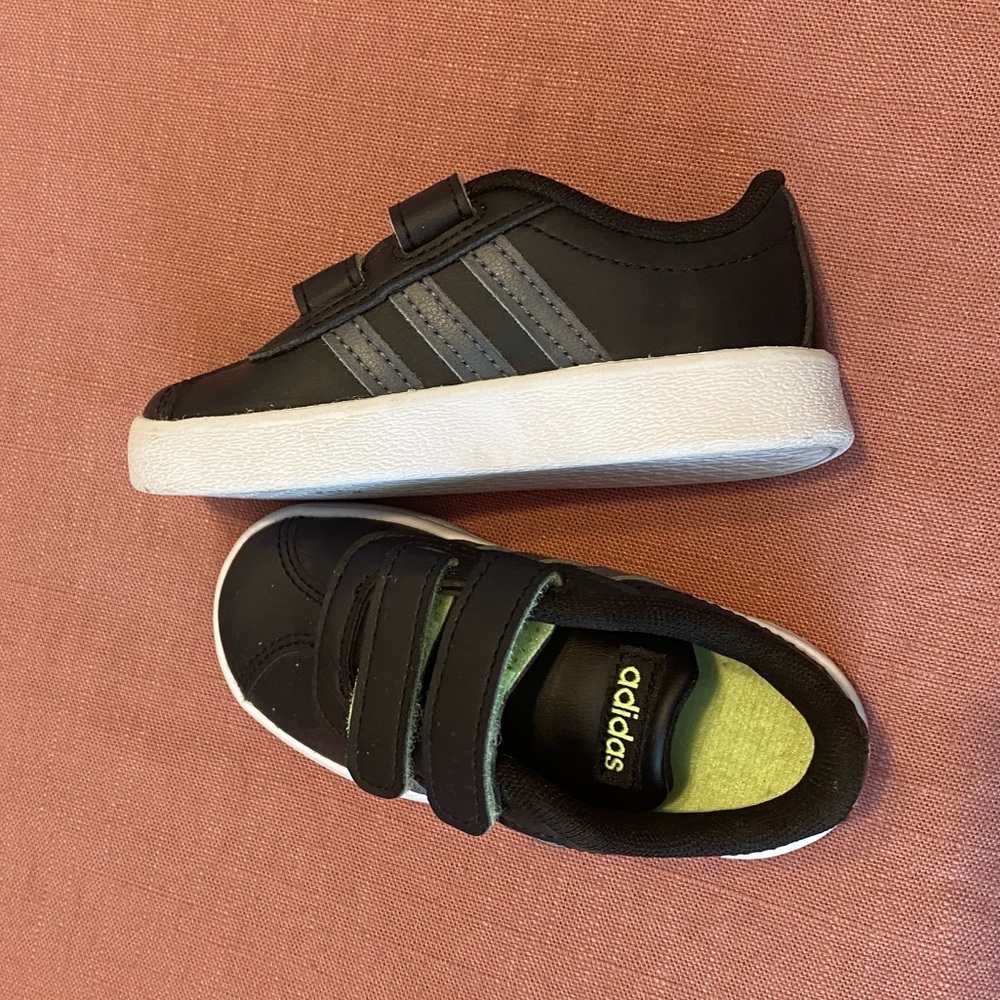 Black adidas. Never worn.